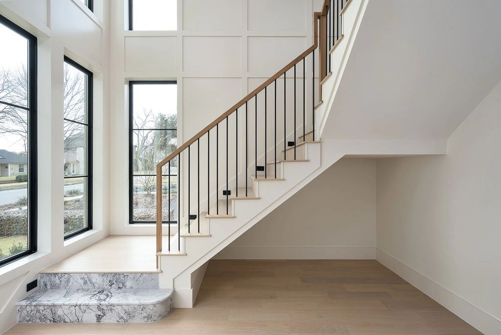 Light-filled staircase — Select Custom Home
